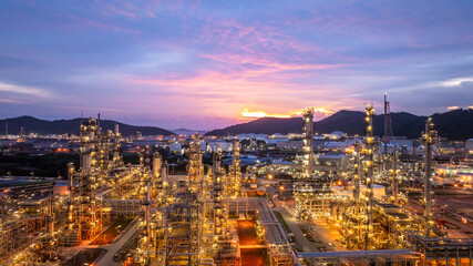 Oil and gas industrial refinery at night, Oil and gas refinery petrochemical plant pipeline steel, Oil and gas refinery factory oil and gas storage tank pipeline steel at night, Global energy refinery