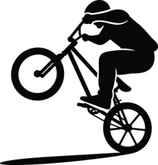 Fototapeta premium A silhouette of a cyclist performing a wheelie on a bmx bike against a white background image view