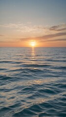 Obraz premium Serene Sunset over Calm Ocean Waters A Peaceful Seascape