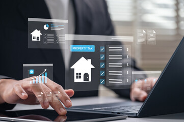 Property tax checklist and financial planning displayed on virtual screen as businessman uses...