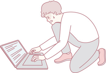 A young man is intensely typing away on a laptop, showcasing his determination and deep level of engagement in his work