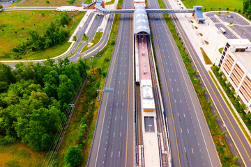 drone view of the Virginia Metro Overground Station. Highways, parking and bus stops.