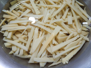 Pickled bamboo shoot slices, top view.