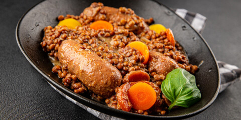 Sausage with lentils and vegetables appetizer vegetable dish fresh tasty gourmet food background on the table rustic food top view copy space
