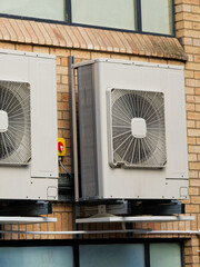 Heat pump condenser units for heating and cooling modern building