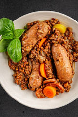Sausage with lentils and vegetables appetizer vegetable dish fresh tasty gourmet food background on the table rustic food top view copy space