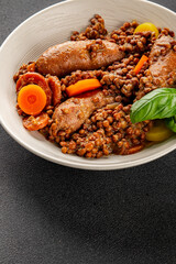 Sausage with lentils and vegetables appetizer vegetable dish fresh tasty gourmet food background on the table rustic food top view copy space