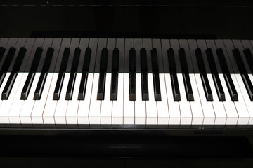 Fototapeta premium close up view of piano in bedroom 
