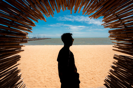 silhouette of a man on the beach