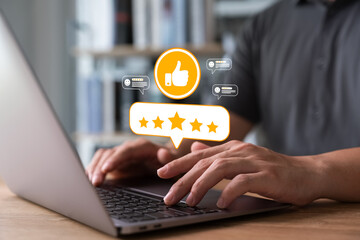 Plakat review and satisfaction concept, Customer giving five star rating and positive feedback on laptop, online reputation management for business and digital marketing performance.