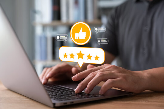 review and satisfaction concept, Customer giving five star rating and positive feedback on laptop, online reputation management for business and digital marketing performance.