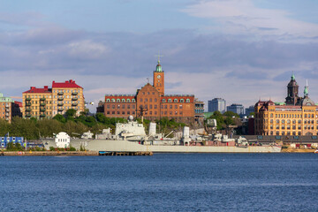 Gothenburg city skyline with HswMS Halland class destroyer Smaland and Navigation school on sunny day, Sweden