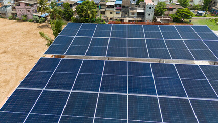 Solar panel close up with city background.