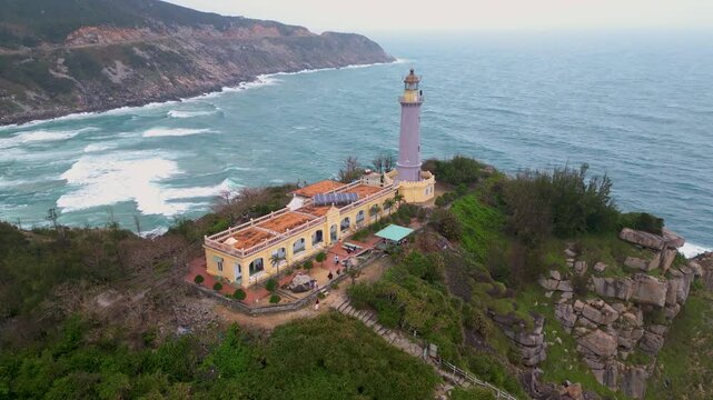 Stunning coastal view of a historic lighthouse overlooking the ocean