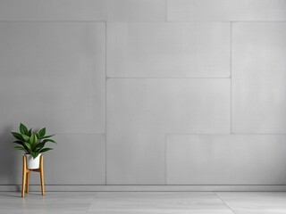 A minimalist interior scene featuring a smooth gray wall and a potted green plant on a wooden stand. The design is modern and clean, ideal for mockup purposes.