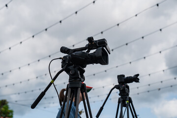 Media camera technology for portraying certain narrative with cloudy dark skies above, media...