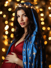 Christmas portrait of pregnant Madonna in embroidered robe

