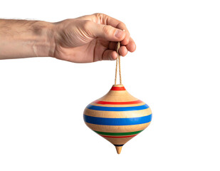 Hand Holding Traditional Mexican Spinning Top. Tompo
