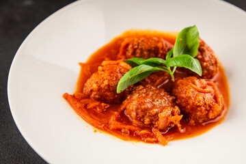 Meatballs tomato sauce beef, pork or chicken meat fresh delicious gourmet food background on the table rustic food top view copy space keto and paleo diet