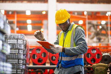 African workers working happy aftter working of maintenance machine in heavy industrial factory