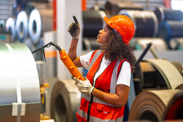 African workers working happy aftter working of maintenance machine in heavy industrial factory