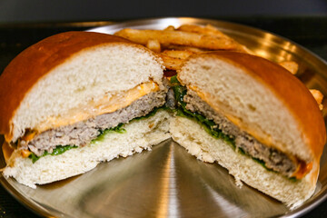 Homemade hamburger cut in half