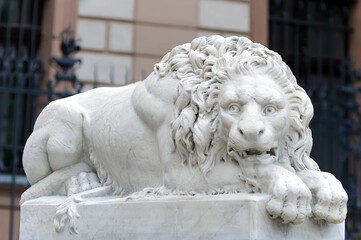 White lion statue at Moszna castle in Poland