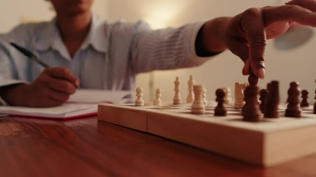 Woman Strategizing Her Next Chess Move