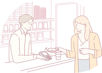 A customer making a payment with a card at a caf, showcasing modern payment methods