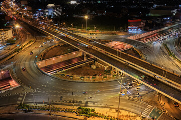 Expressway, Self-driving autonomous electric cars of the future with elements move along a busy traffic intersection. Artificial Intelligence, Car Scan, GPS Tracking, Smart Roads, IoT, highway
