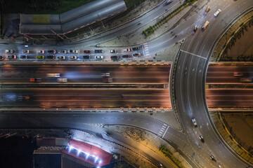 Expressway, Self-driving autonomous electric cars of the future with elements move along a busy traffic intersection. Artificial Intelligence, Car Scan, GPS Tracking, Smart Roads, IoT, highway