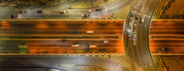 Expressway, Self-driving autonomous electric cars of the future with elements move along a busy...