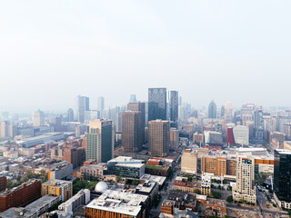 Fototapeta premium Heavy smog in Montreal downtown because of wildfire and industrial pollution, Quebec, Canada