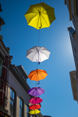 Colorful umbrellas above the streets Deventer. High quality photo