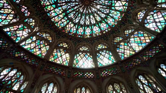 a close up of a stained glass dome in a building