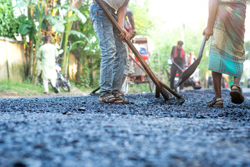 Bangladeshi Road Development – Bitumen Application in Progress