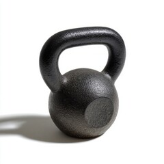 Iron kettlebell in solitary spotlight, evoking strength and resilience, perfect for World Health Day and National Physical Fitness Month