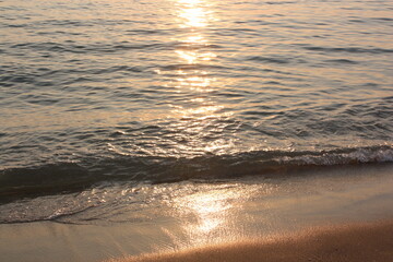 the shimmer of the sea at sunset
