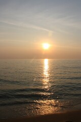 the shimmer of the sea at sunset