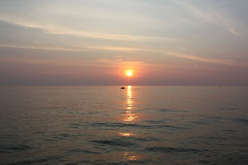 the shimmer of the sea at sunset