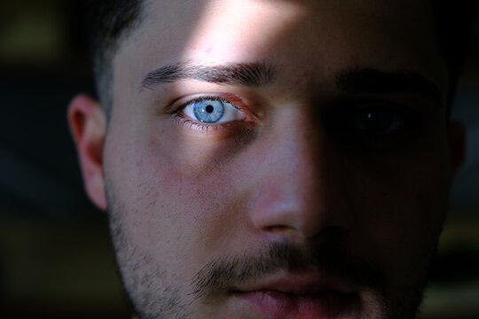 A young man with blue eyes