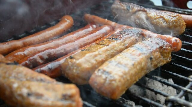 Grilling Sausages on Barbecue Grill