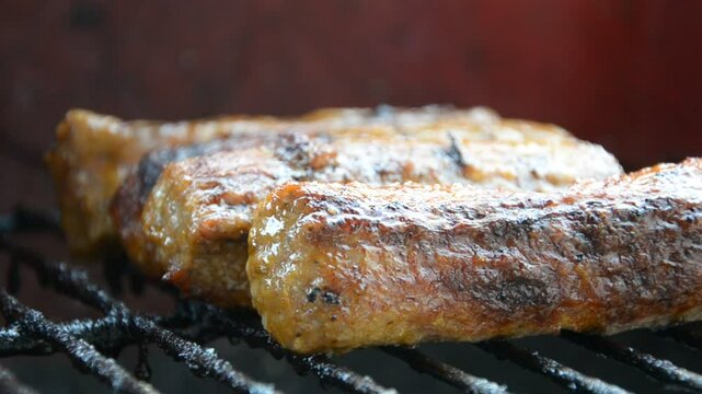 Grilling Sausages on Barbecue Grill