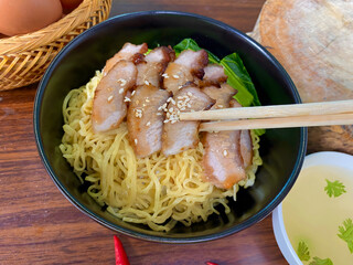 Barbecue Pork Noodle Bowl with Sesame and Clear Soup &ndash; Asian Street Food Presentation