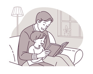 Happy Father and Son Reading a Book Together at Home
