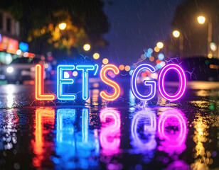 Bright neon letters spelling “LET’S GO” glow vividly on a wet city street at night, reflecting colorful lights in the rain-soaked pavement.