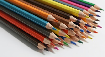 Naklejka premium Colorful Pencils: Close-Up Still Life of a Stack of Sharpened Colored Pencils on White Background