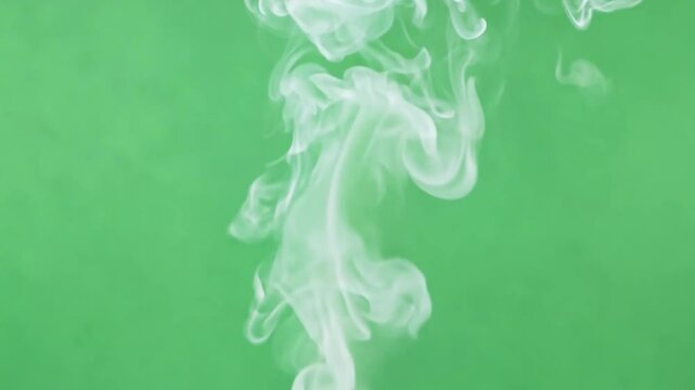 Ethereal white mist floats against a solid green chroma key, providing a mystical and adaptable visual for creative projects. Generative AI