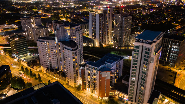 Aerial drone photo of Cardiff city centre at night, including residential apartments, student blocks and hotels alongside Bute Terrace
