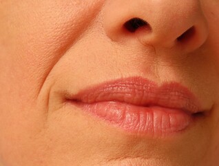 Obraz premium Closeup of woman face. Woman in her forties face.